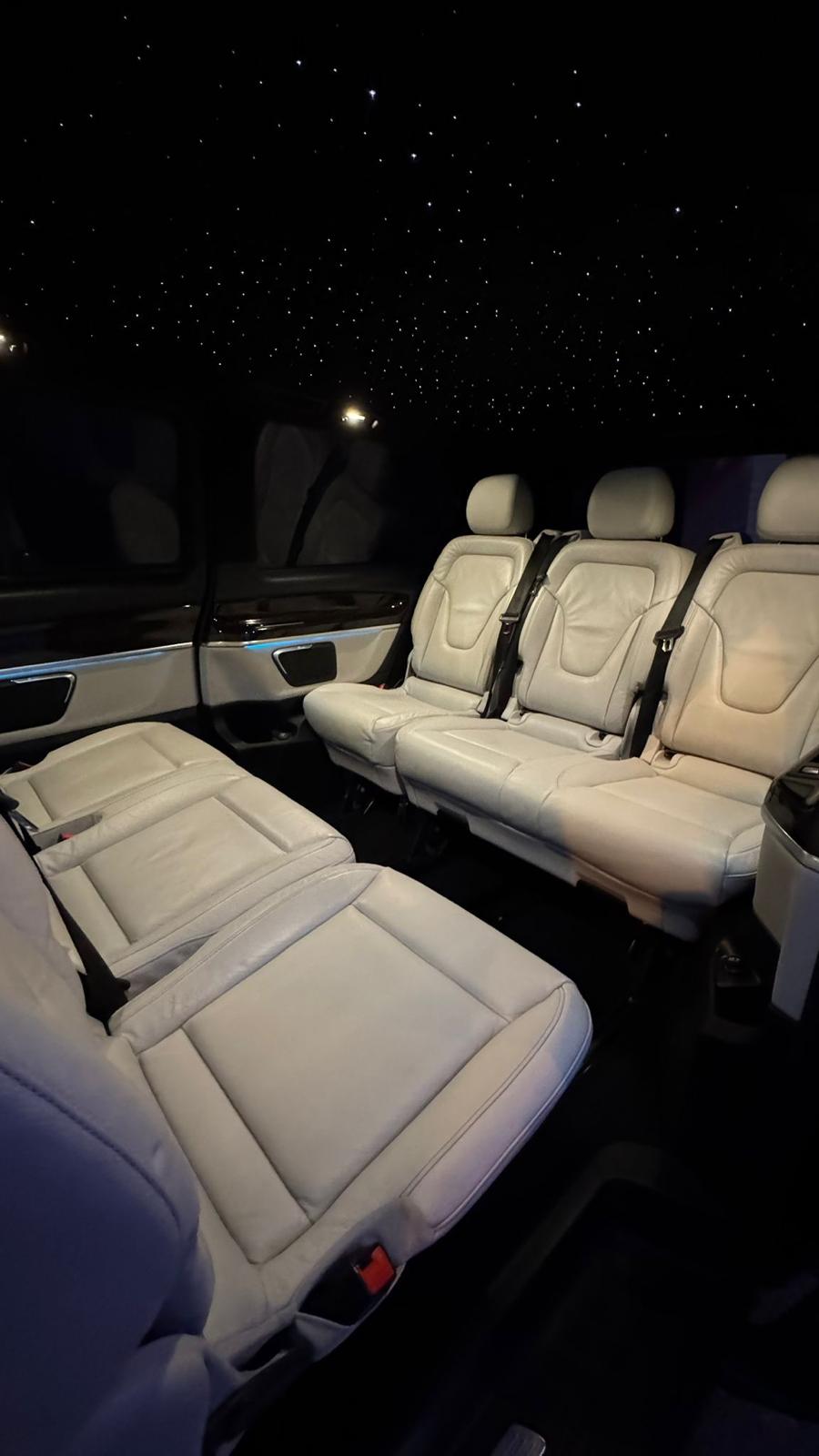Mercedes V-Class interior with cream leather seats and a starlight headliner